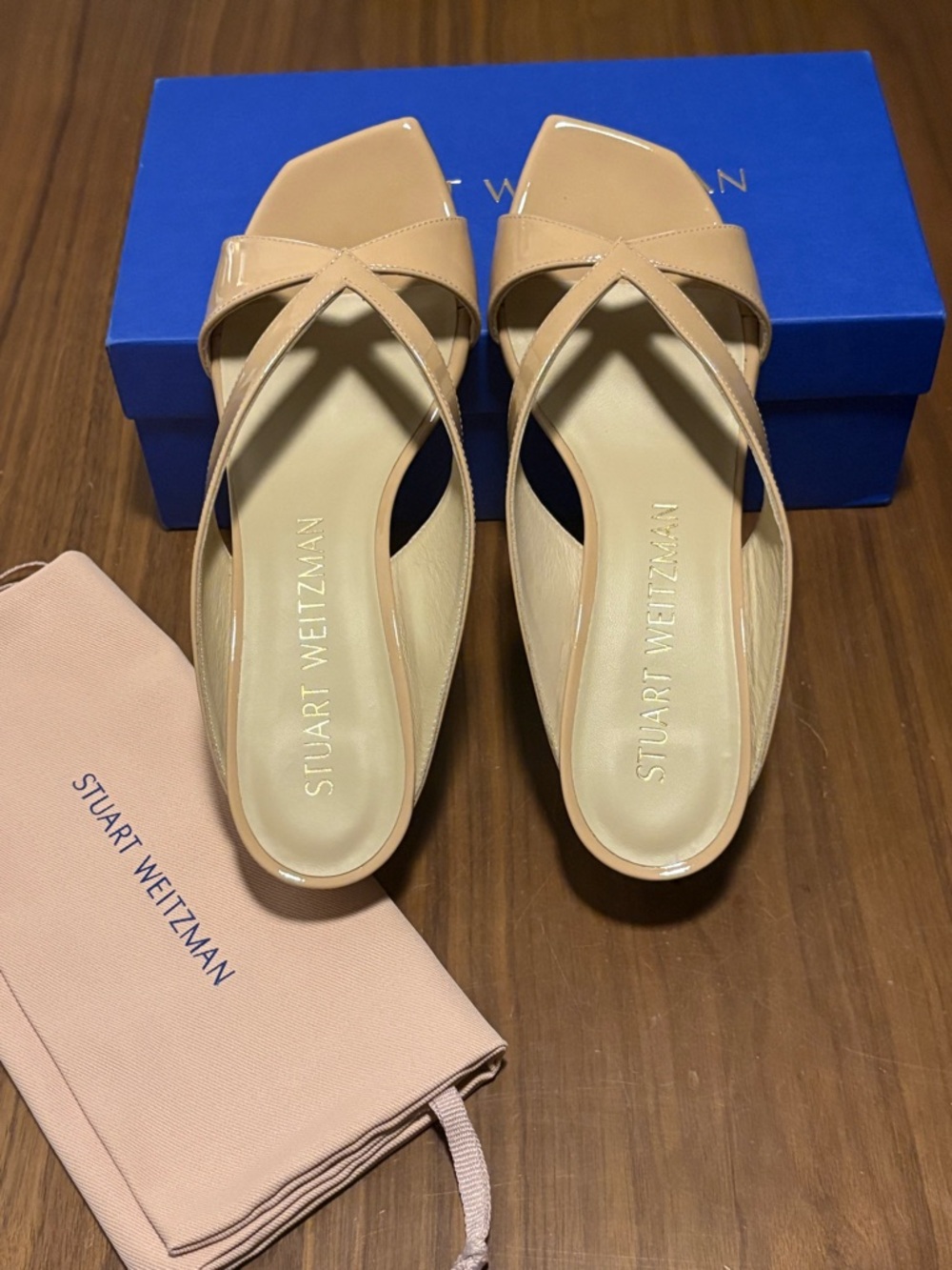 Stuart Weitzman Nude Patent Cross-Strap Slide Mules
